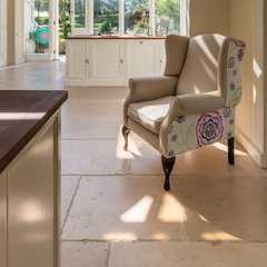 Enhance your home with Avignon Heavy Tumbled Limestone Tiles, featuring warm neutral tones and a be